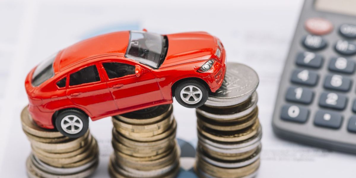 toy-car-balancing-increasing-coin-stack